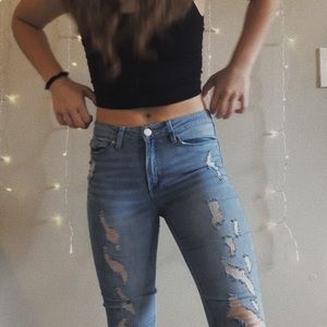 Distressed light wash jeans